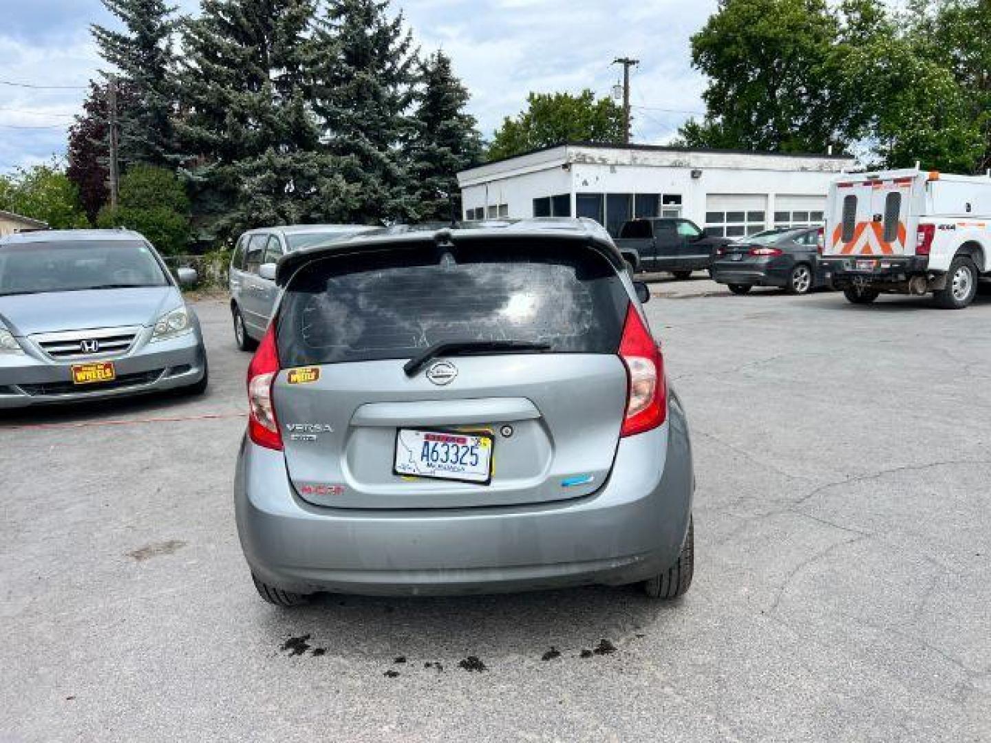 2014 Nissan Versa Note S (3N1CE2CPXEL) with an 1.6L L4 DOHC 16V engine, 5-Speed Manual transmission, located at 601 E. Idaho St., Kalispell, MT, 59901, (406) 300-4664, 0.000000, 0.000000 - Photo#4