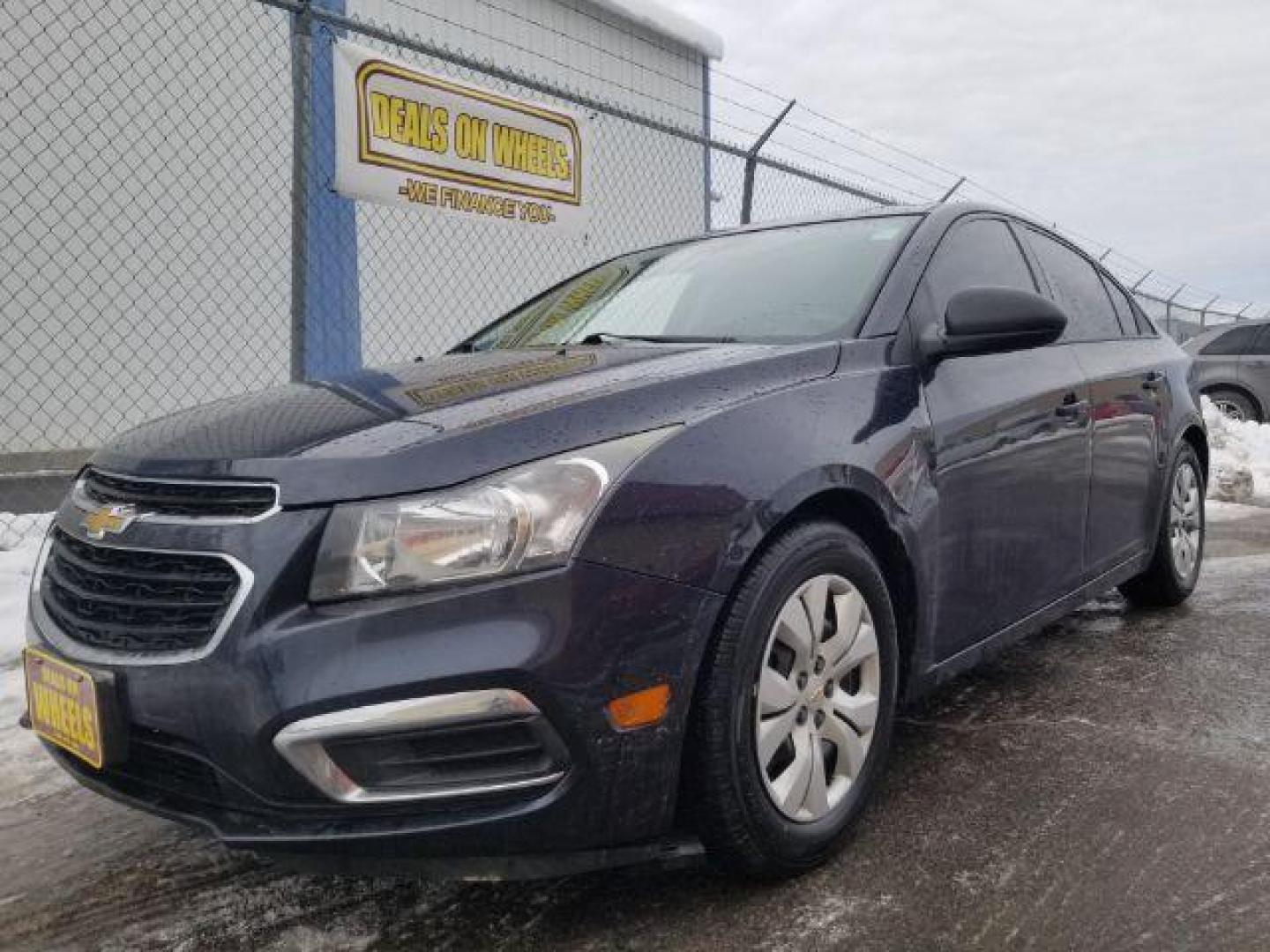 2015 Chevrolet Cruze LS Auto (1G1PA5SG7F7) with an 1.8L L4 DOHC 16V engine, 6-Speed Automatic transmission, located at 4047 Montana Ave., Billings, MT, 59101, 45.770847, -108.529800 - Photo#0