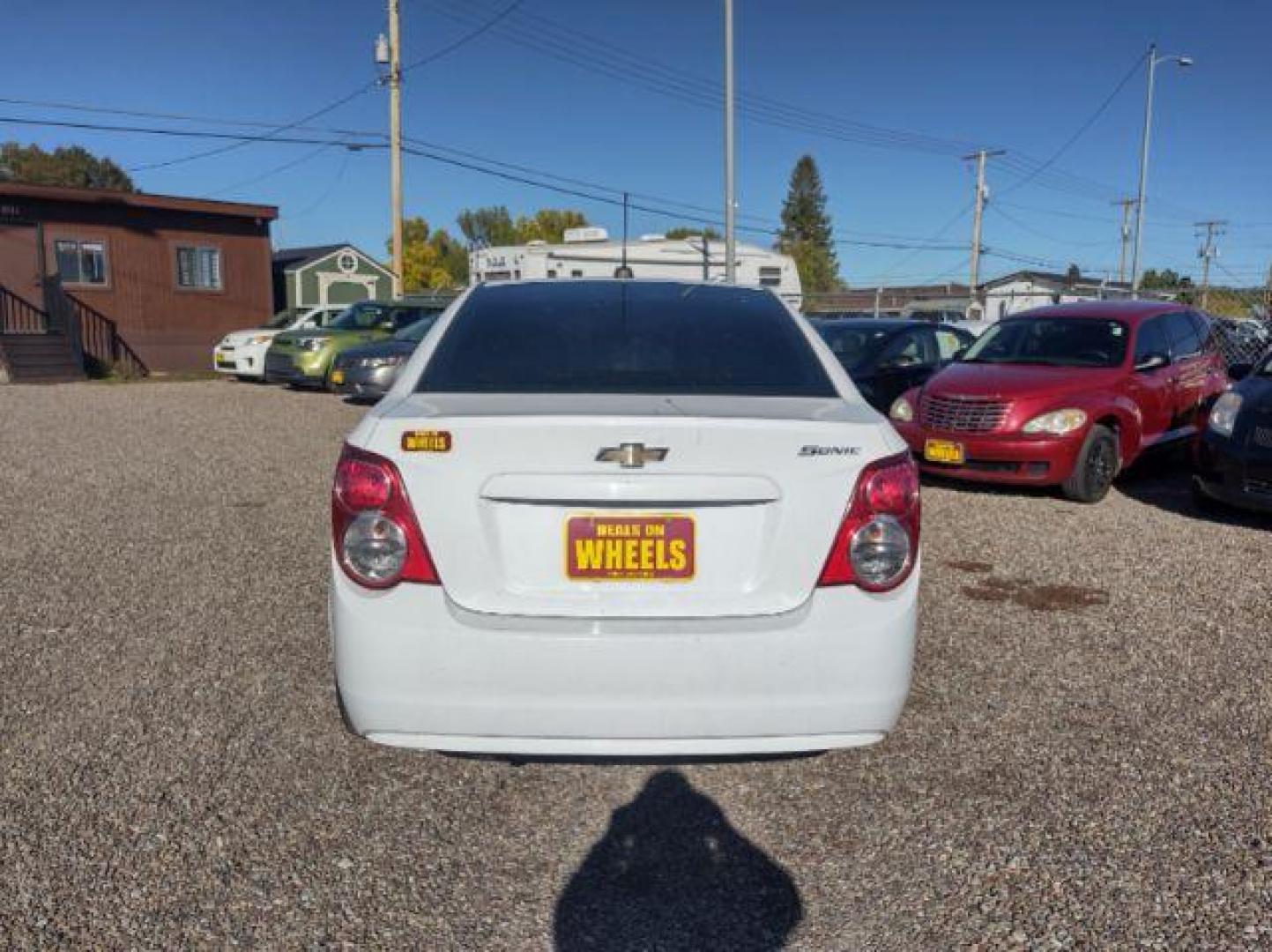 2015 Chevrolet Sonic LS Auto Sedan (1G1JA5SG2F4) with an 1.8L L4 DOHC 24V engine, 6-Speed Automatic transmission, located at 4801 10th Ave S,, Great Falls, MT, 59405, 0.000000, 0.000000 - Photo#3