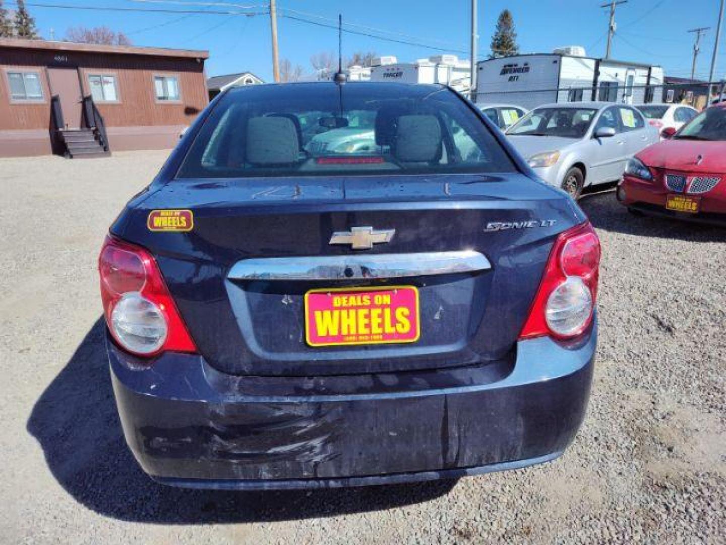 2015 Chevrolet Sonic LT Auto Sedan (1G1JC5SHXF4) with an 1.8L L4 DOHC 24V engine, 6-Speed Automatic transmission, located at 4801 10th Ave S,, Great Falls, MT, 59405, 0.000000, 0.000000 - Photo#3