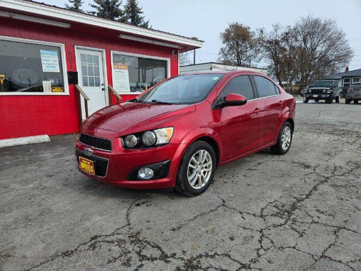 2015 Chevrolet Sonic LT Auto Sedan (1G1JC5SH4F4) with an 1.8L L4 DOHC 24V engine, 6-Speed Automatic transmission, located at 601 E. Idaho St., Kalispell, MT, 59901, (406) 300-4664, 0.000000, 0.000000 - Photo#0