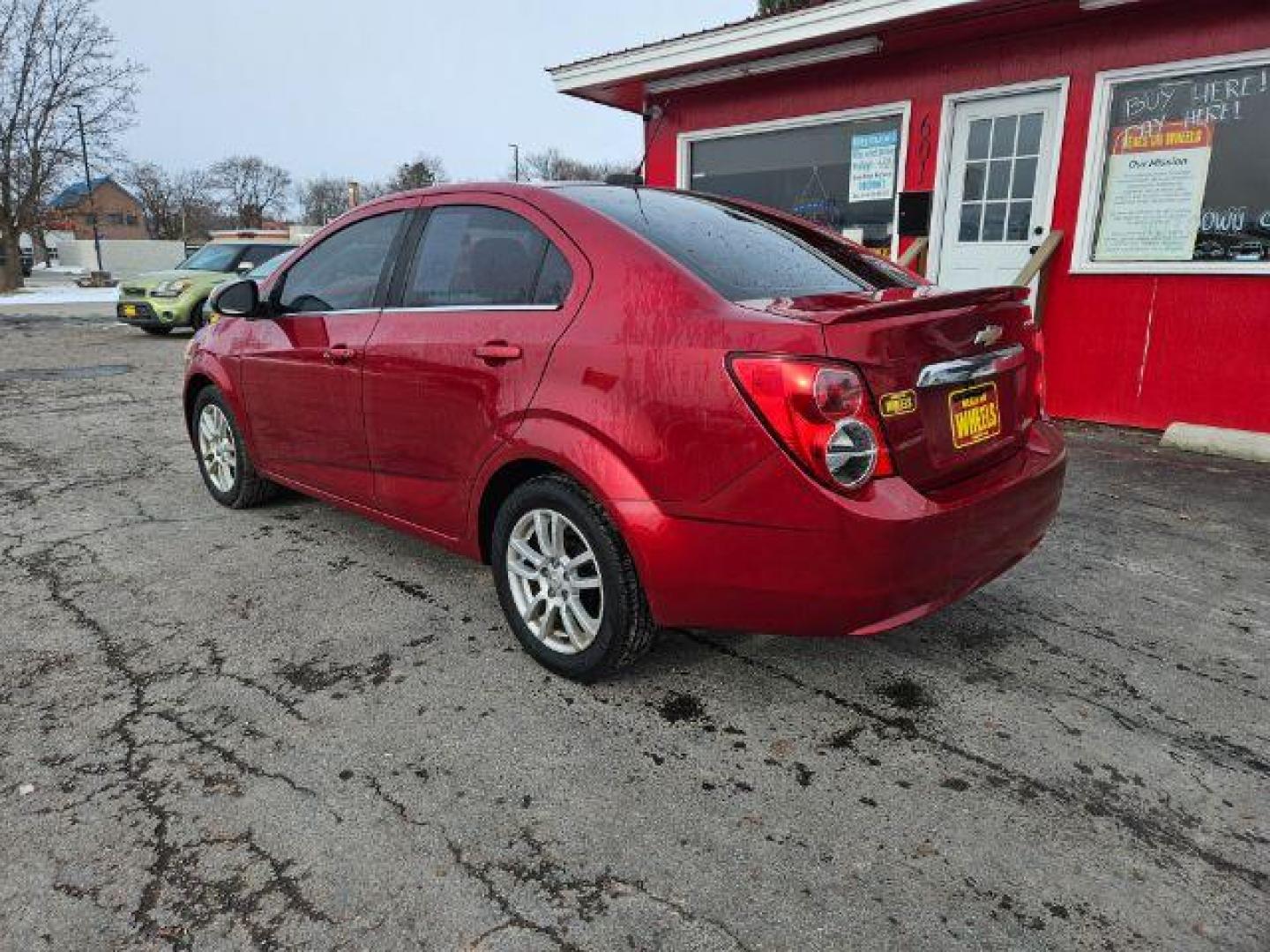 2015 Chevrolet Sonic LT Auto Sedan (1G1JC5SH4F4) with an 1.8L L4 DOHC 24V engine, 6-Speed Automatic transmission, located at 601 E. Idaho St., Kalispell, MT, 59901, (406) 300-4664, 0.000000, 0.000000 - Photo#2