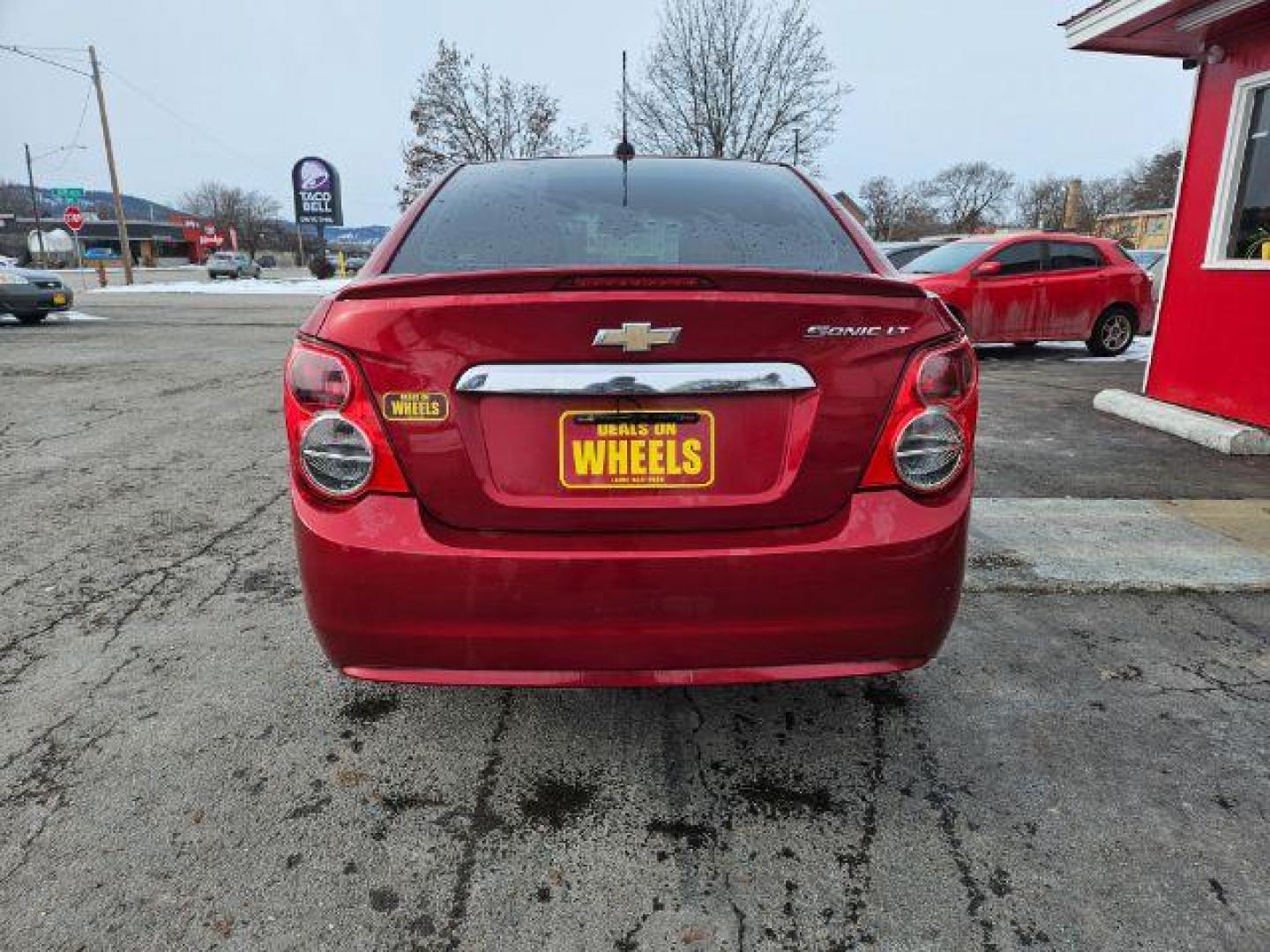 2015 Chevrolet Sonic LT Auto Sedan (1G1JC5SH4F4) with an 1.8L L4 DOHC 24V engine, 6-Speed Automatic transmission, located at 601 E. Idaho St., Kalispell, MT, 59901, (406) 300-4664, 0.000000, 0.000000 - Photo#3