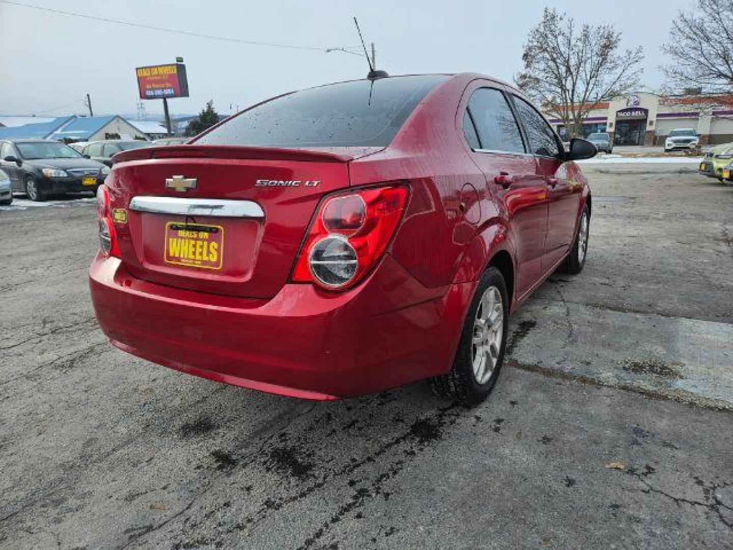 2015 Chevrolet Sonic LT Auto Sedan (1G1JC5SH4F4) with an 1.8L L4 DOHC 24V engine, 6-Speed Automatic transmission, located at 601 E. Idaho St., Kalispell, MT, 59901, (406) 300-4664, 0.000000, 0.000000 - Photo#4