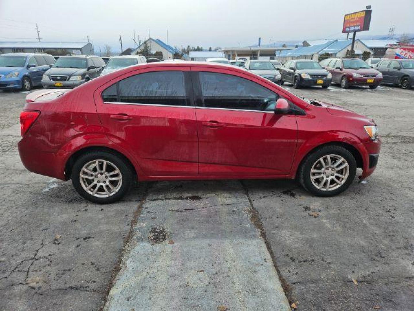 2015 Chevrolet Sonic LT Auto Sedan (1G1JC5SH4F4) with an 1.8L L4 DOHC 24V engine, 6-Speed Automatic transmission, located at 601 E. Idaho St., Kalispell, MT, 59901, (406) 300-4664, 0.000000, 0.000000 - Photo#5