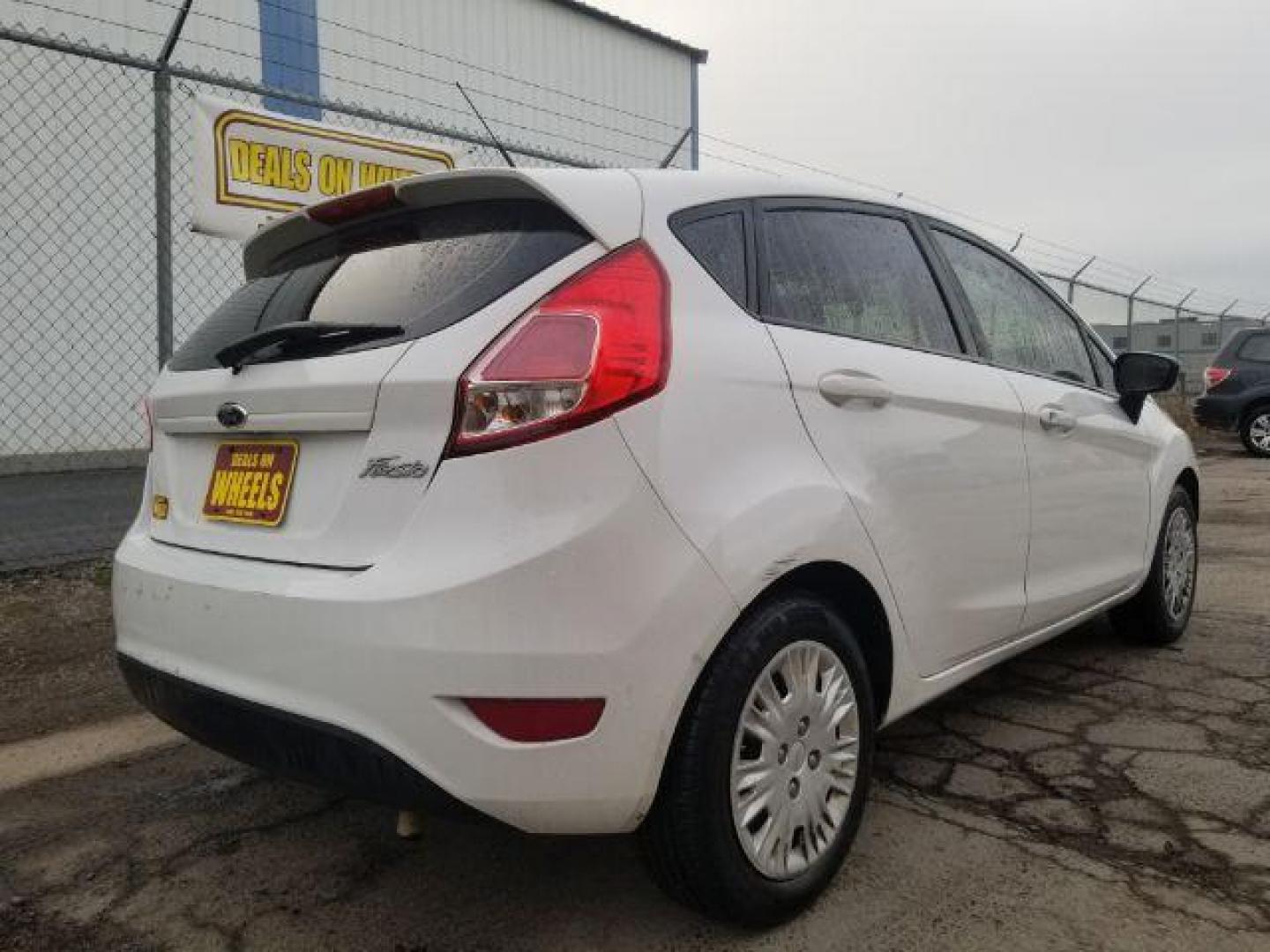 2015 Ford Fiesta S Hatchback (3FADP4TJXFM) with an 1.6L L4 DOHC 16V engine, located at 4047 Montana Ave., Billings, MT, 59101, 45.770847, -108.529800 - Photo#4