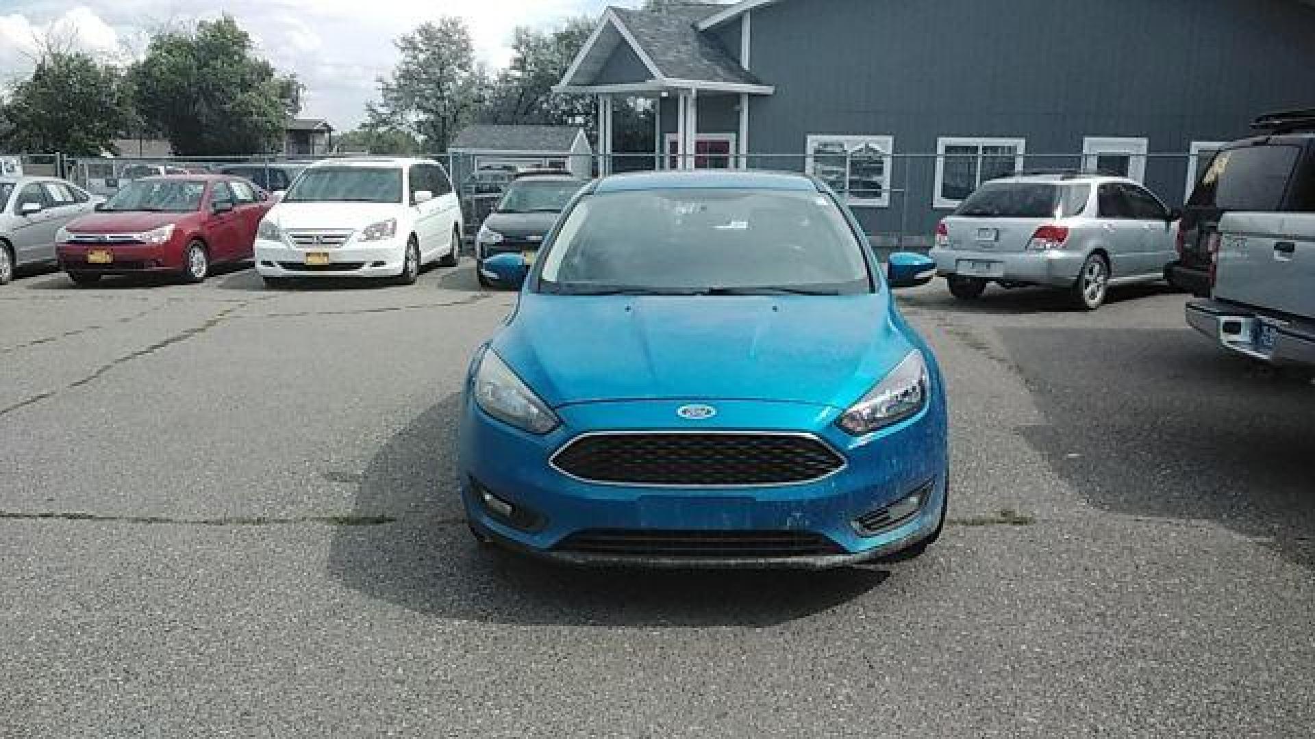 2015 Ford Focus SE Hatch (1FADP3K29FL) with an 2.0L L4 DOHC 16V engine, 5-Speed Manual transmission, located at 1821 N Montana Ave., Helena, MT, 59601, 0.000000, 0.000000 - Photo#1