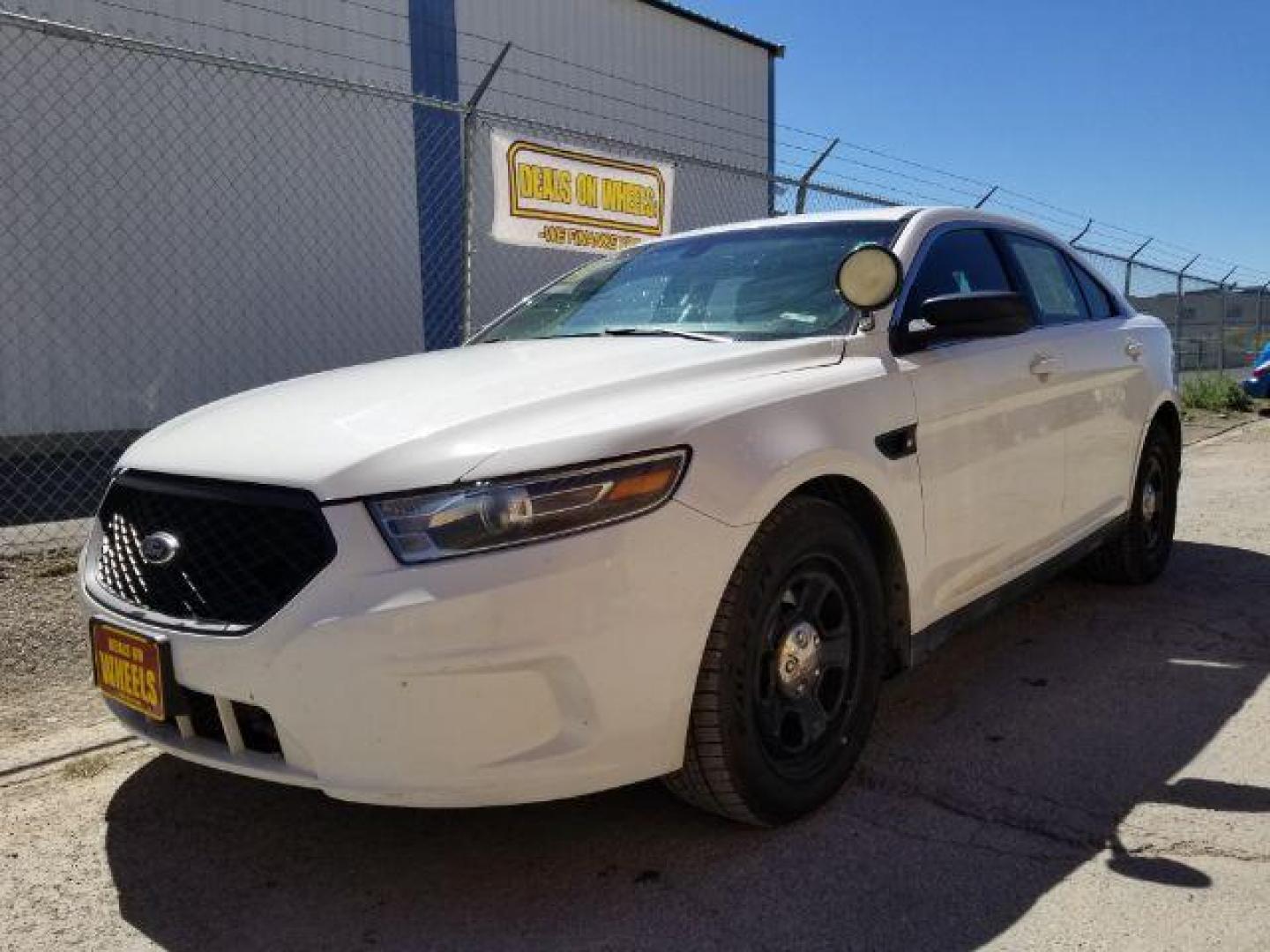 2015 Ford Taurus Police AWD (1FAHP2MKXFG) with an 3.7L V6 DOHC 24V engine, 6-Speed Automatic transmission, located at 1800 West Broadway, Missoula, 59808, (406) 543-1986, 46.881348, -114.023628 - Photo#0