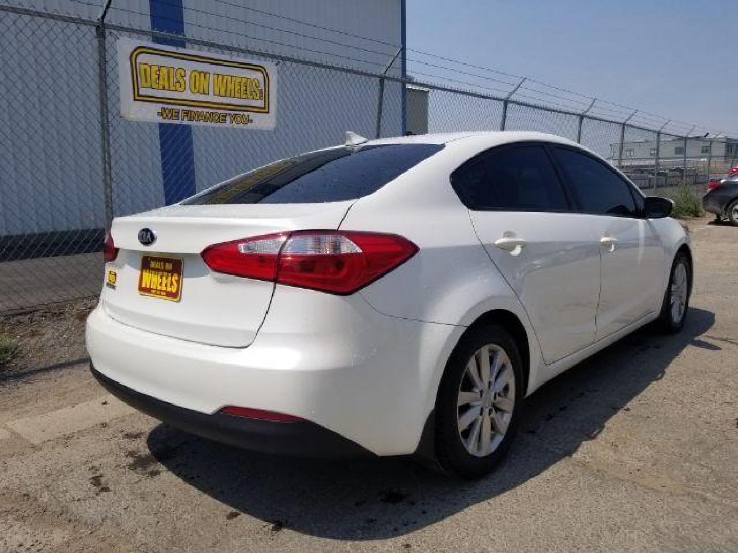 2015 Kia Forte EX (KNAFX4A69F5) with an 1.8L L4 DOHC 16V engine, 6-Speed Automatic transmission, located at 601 E. Idaho St., Kalispell, MT, 59901, (406) 300-4664, 0.000000, 0.000000 - Photo#4