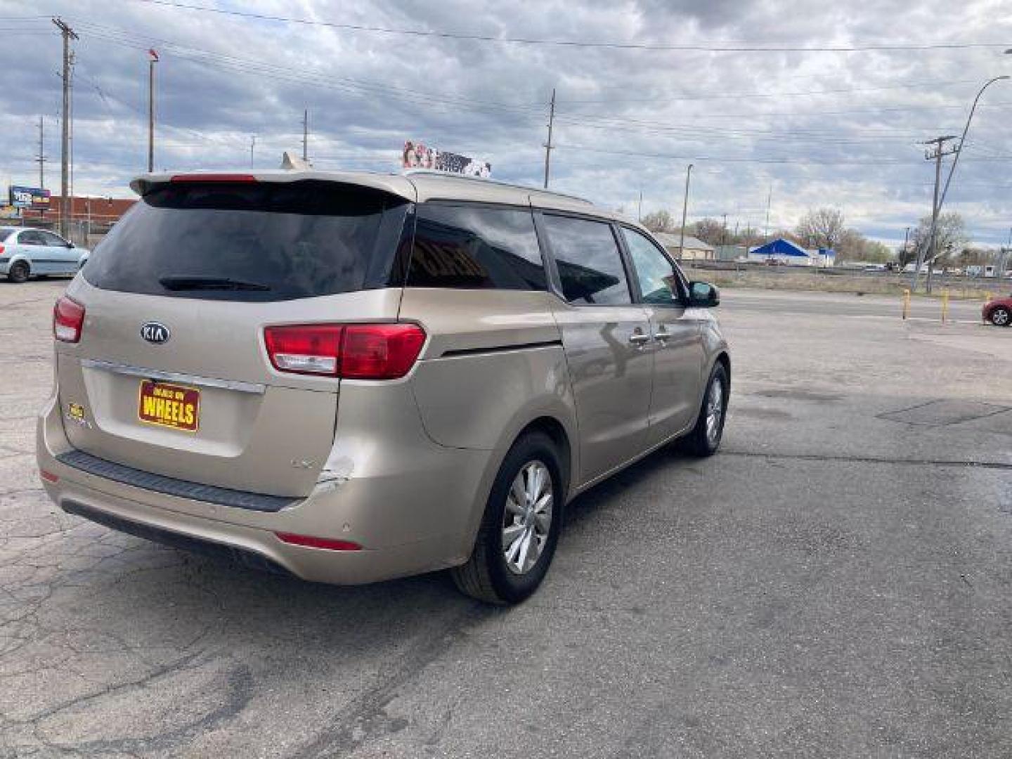 2015 Kia Sedona LX (KNDMB5C18F6) with an 3.3L V6 DOHC 24V engine, 6-Speed Automatic transmission, located at 4047 Montana Ave., Billings, MT, 59101, 45.770847, -108.529800 - Photo#3