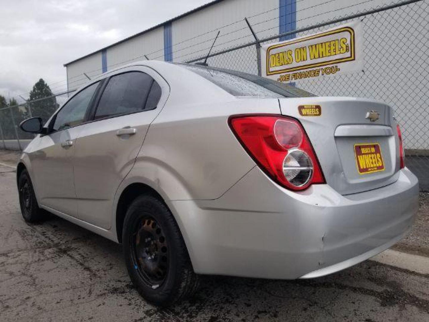 2016 Chevrolet Sonic LS Auto Sedan (1G1JA5SH1G4) with an 1.8L L4 DOHC 24V engine, 6-Speed Automatic transmission, located at 4047 Montana Ave., Billings, MT, 59101, 45.770847, -108.529800 - Photo#5