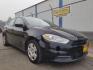 2016 Black Dodge Dart SE (1C3CDFAA7GD) with an 2.0L L4 DOHC 16V TUR engine, located at 601 E. Idaho St., Kalispell, MT, 59901, (406) 300-4664, 0.000000, 0.000000 - Photo#2