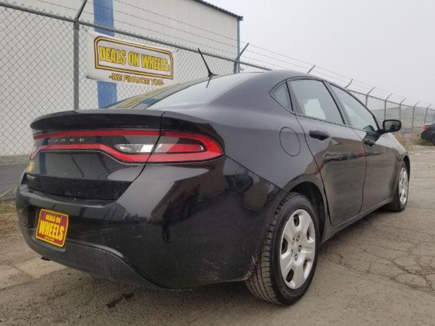 2016 Black Dodge Dart SE (1C3CDFAA7GD) with an 2.0L L4 DOHC 16V TUR engine, located at 601 E. Idaho St., Kalispell, MT, 59901, (406) 300-4664, 0.000000, 0.000000 - Photo#4