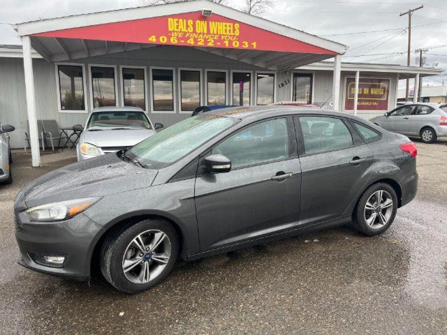 2017 Ford Focus SE Sedan (1FADP3FEXHL) with an 1.0L L3 engine, located at 1821 N Montana Ave., Helena, MT, 59601, 0.000000, 0.000000 - Photo#0